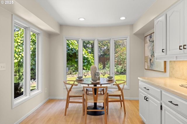 2395 SW Timberline Dr, Portland, OR 97225 - dining space with baseboards, light wood finished floors, and recessed lighting