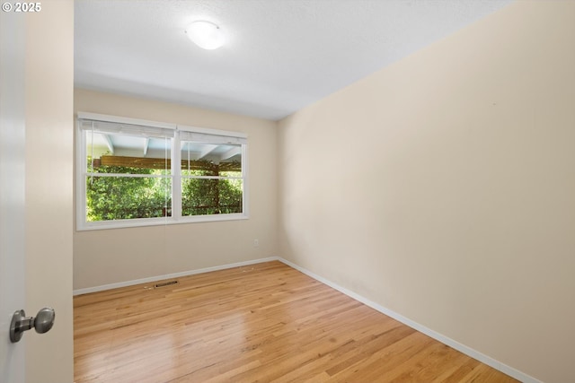 2395 SW Timberline Dr, Portland, OR 97225 - unfurnished room with light wood-type flooring and baseboards