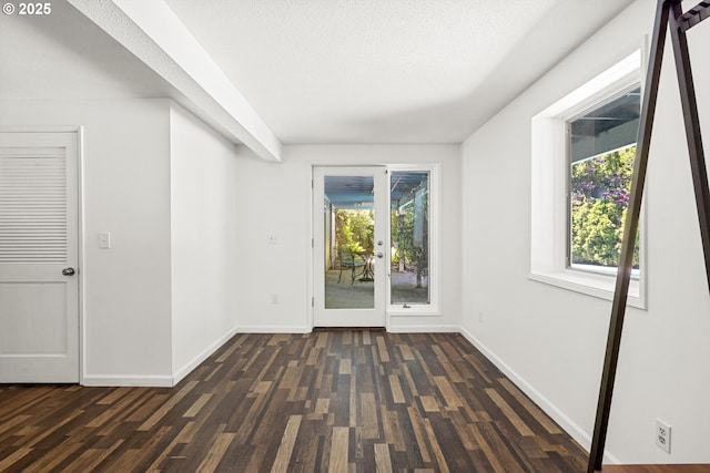 2395 SW Timberline Dr, Portland, OR 97225 - unfurnished room with dark wood-style flooring, baseboards, and french doors