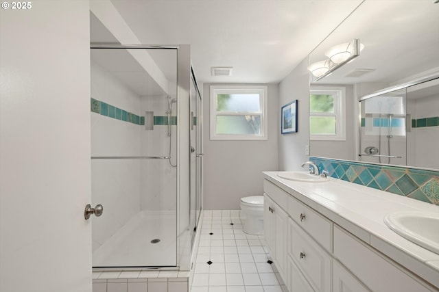 2395 SW Timberline Dr, Portland, OR 97225 - bathroom featuring toilet, a shower stall, double vanity, and tile patterned flooring