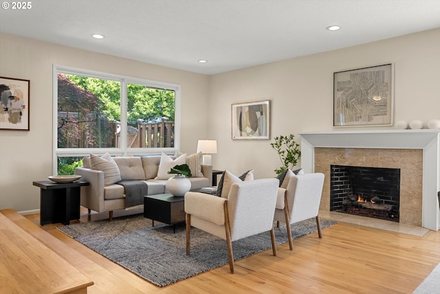 2395 SW Timberline Dr, Portland, OR 97225 - living room featuring wood finished floors, recessed lighting, and a fireplace