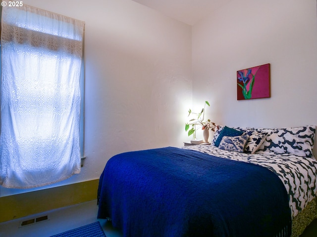 bedroom with visible vents