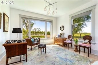 53139 Appleton Rd, Milton-Freewater, OR 97862 - sitting room featuring healthy amount of natural light, a chandelier, and baseboards