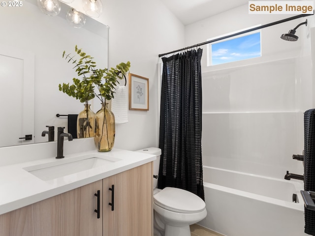 bathroom featuring toilet, shower / bathtub combination with curtain, and vanity