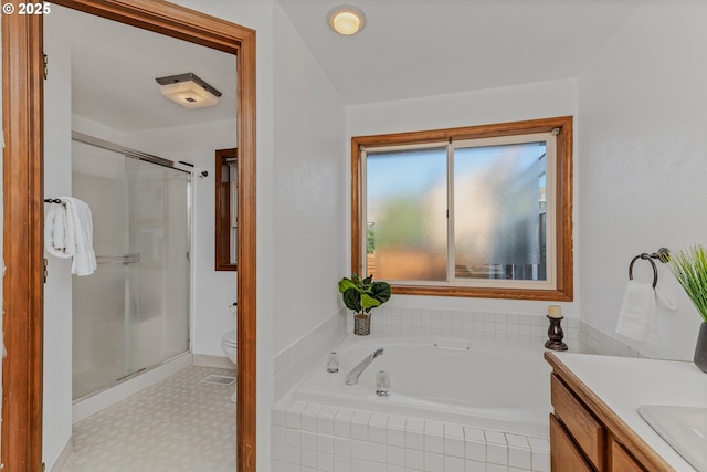 7215 NE Par Ln, Vancouver, WA 98662 - full bathroom with a shower stall, a bath, vanity, toilet, and tile patterned floors