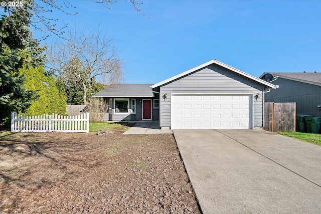 ranch-style home with a garage, concrete driveway, and fence