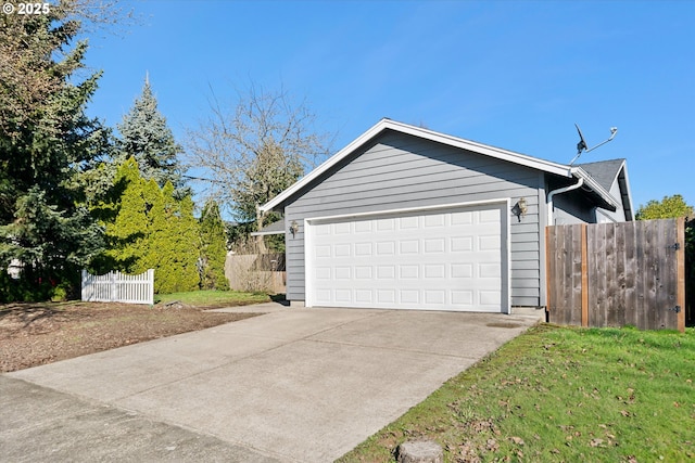 garage featuring fence