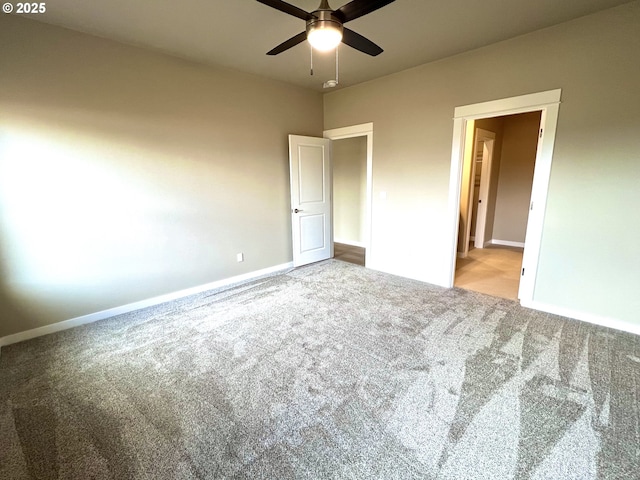 947 Medina Ave, Sutherlin, OR 97479 - unfurnished bedroom with carpet floors, baseboards, and a ceiling fan