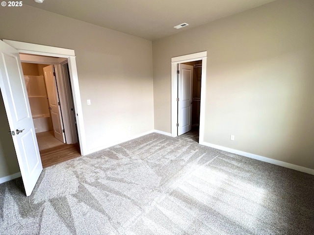 947 Medina Ave, Sutherlin, OR 97479 - unfurnished bedroom with a closet, carpet, visible vents, and baseboards