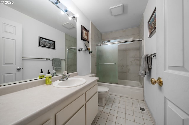 17622 NW Rolling Hill Ln, Beaverton, OR 97006 - bathroom with tile patterned flooring, vanity, toilet, and shower / bath combination with glass door