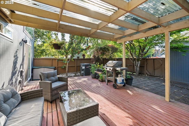 17622 NW Rolling Hill Ln, Beaverton, OR 97006 - wooden deck with a fenced backyard, outdoor lounge area, and a pergola