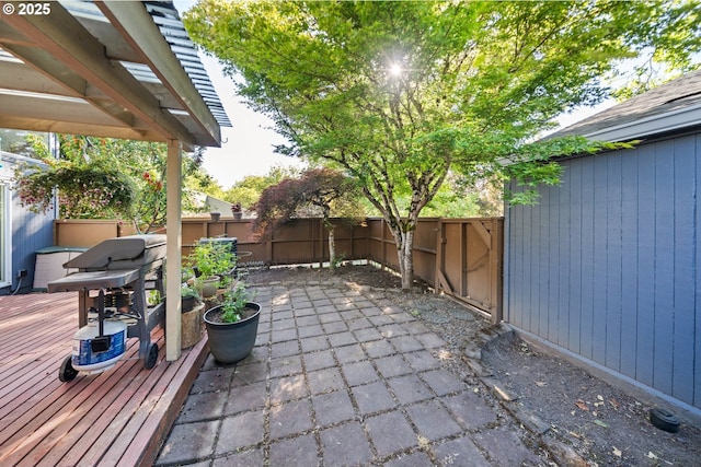 17622 NW Rolling Hill Ln, Beaverton, OR 97006 - fenced backyard with a patio area and a deck