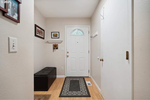 17622 NW Rolling Hill Ln, Beaverton, OR 97006 - entryway featuring light wood-style floors and baseboards