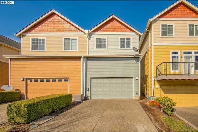 view of front facade with a garage and concrete driveway