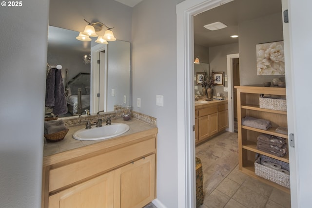 bathroom featuring vanity and tile patterned flooring