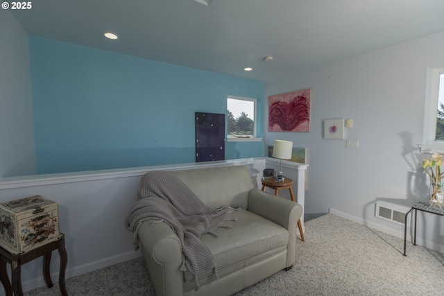 living area featuring recessed lighting, carpet, and baseboards