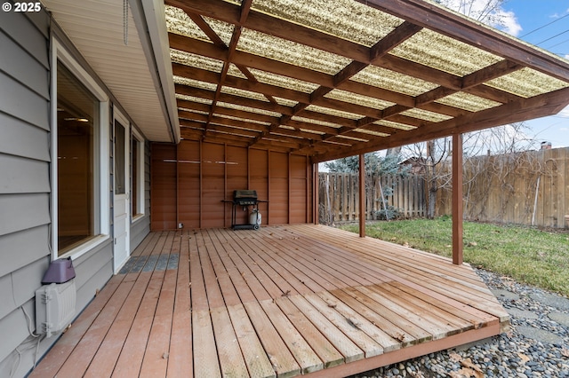 wooden deck featuring area for grilling