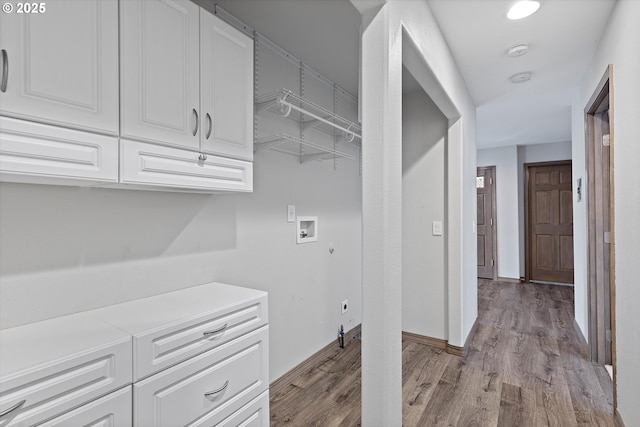 1012 E Foothills Dr, Newberg, OR 97132 - laundry room with washer hookup, cabinet space, and light wood-style floors