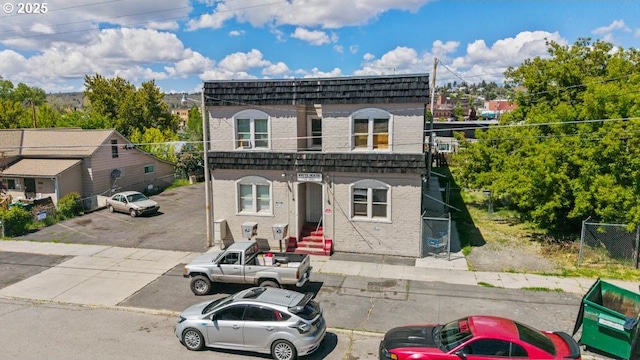224 S Broad St, Klamath Falls, OR 97601 - view of front of property with mansard roof and brick siding