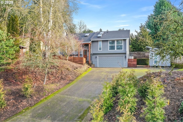 9636 SW Boones Ferry Rd, Portland, OR 97219 - view of front of property with asphalt driveway and an attached garage