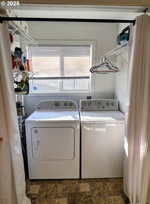 washroom with washer and clothes dryer