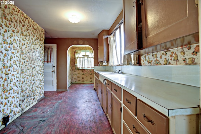 kitchen with pendant lighting and sink