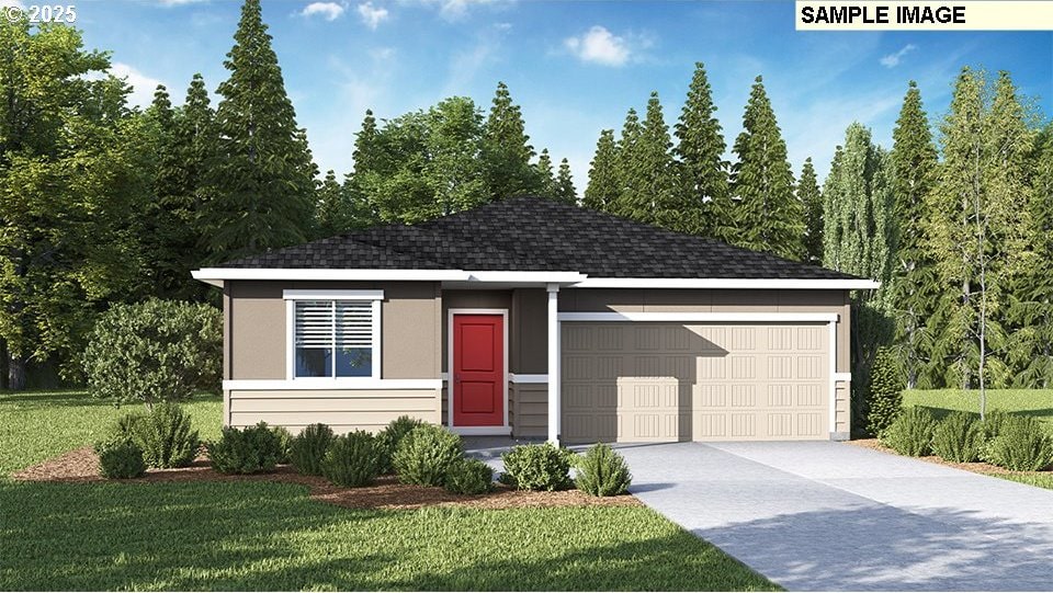 view of front of home with a garage and a front yard