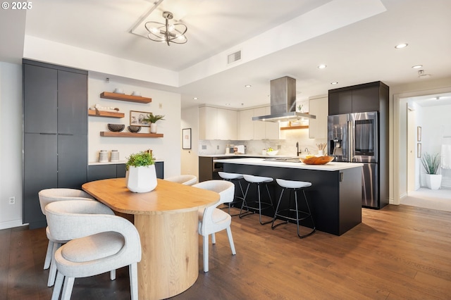 dining space featuring dark wood-type flooring