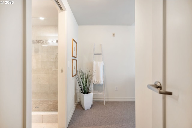 bathroom with a tile shower