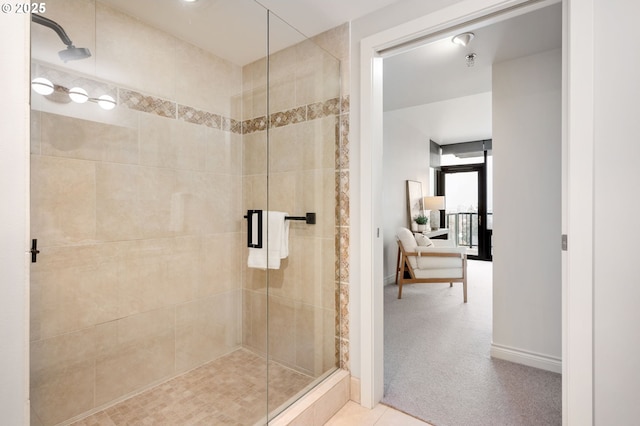 bathroom featuring tile patterned floors and walk in shower