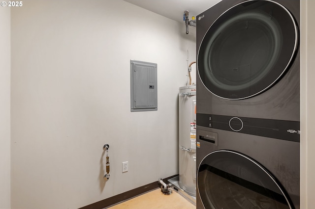 washroom with stacked washing maching and dryer, electric panel, and secured water heater