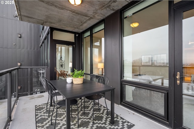 interior space with a wealth of natural light and a wall of windows