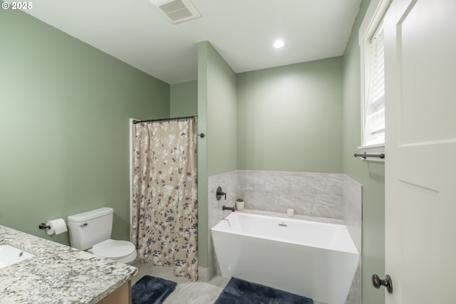 full bathroom featuring toilet, vanity, tile patterned floors, and shower with separate bathtub