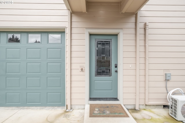 doorway to property featuring ac unit