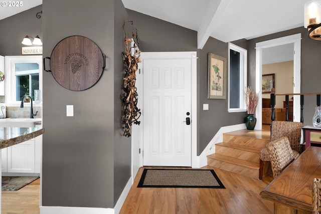 6027 View Loop, Florence, OR 97439 - foyer with light wood finished floors and lofted ceiling