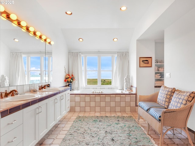 766 Neacoxie Blvd, Gearhart, OR 97138 - full bath featuring healthy amount of natural light, recessed lighting, double vanity, a garden tub, and tile patterned floors