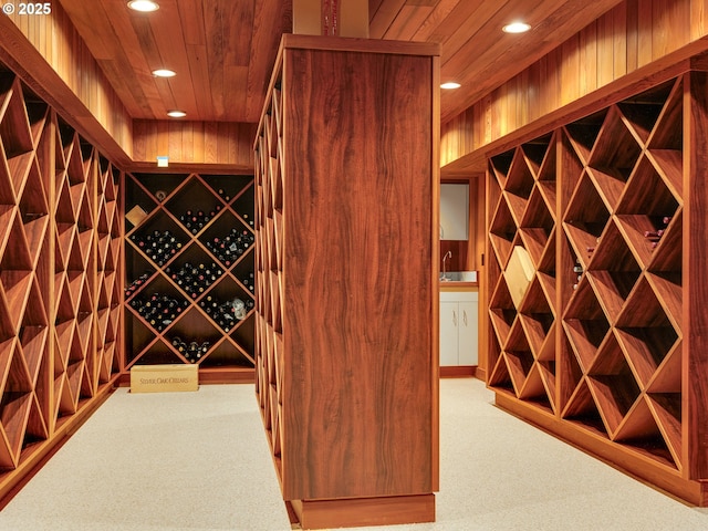 766 Neacoxie Blvd, Gearhart, OR 97138 - wine room featuring recessed lighting, carpet, and wooden ceiling