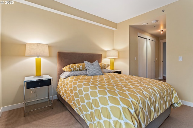 bedroom featuring carpet floors and a closet