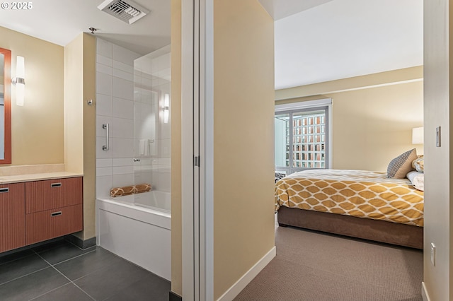 bathroom with tile patterned floors, independent shower and bath, and vanity