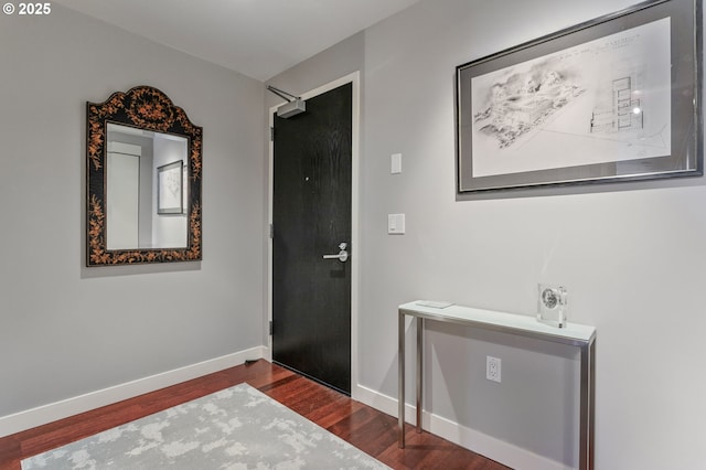 interior space with dark hardwood / wood-style floors