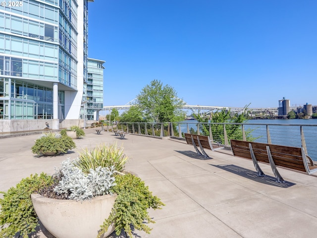 view of home's community with a water view