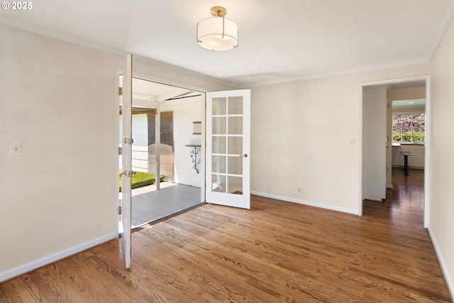 2160 Oakmont Way, Eugene, OR 97401 - empty room with french doors, wood finished floors, and crown molding