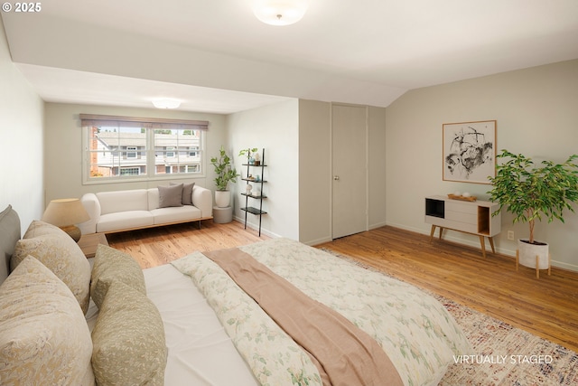 2160 Oakmont Way, Eugene, OR 97401 - bedroom with wood finished floors and vaulted ceiling