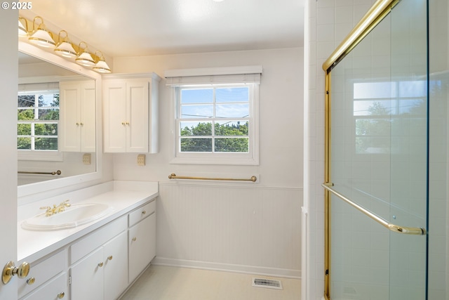 2160 Oakmont Way, Eugene, OR 97401 - full bath with vanity, a stall shower, and wainscoting