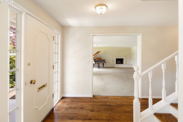 2160 Oakmont Way, Eugene, OR 97401 - foyer entrance with stairway, a fireplace, and wood finished floors