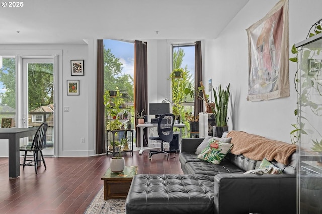 838 SE 38th Ave Unit 311, Portland, OR 97214 - living area with plenty of natural light, wood finished floors, and baseboards