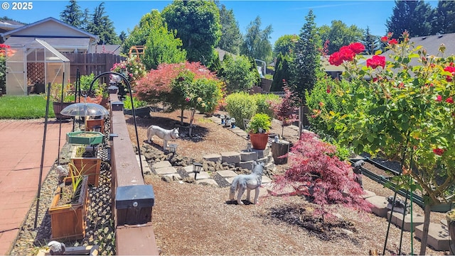 1234 E Fourth Ave, Sutherlin, OR 97479 - view of yard with an exterior structure, a vegetable garden, and an outdoor structure