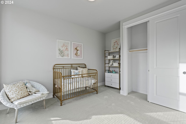 carpeted bedroom with a closet