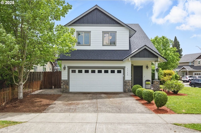 1146 SE Millright Ave, Mcminnville, OR 97128 - craftsman-style home with a shingled roof, stone siding, concrete driveway, an attached garage, and board and batten siding