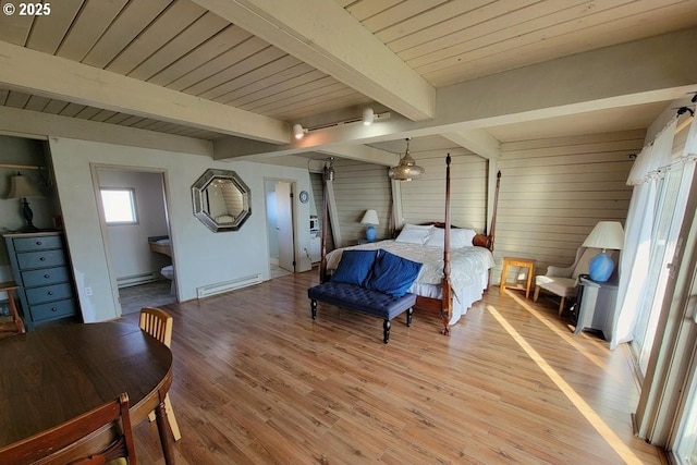 bedroom featuring wooden ceiling, a baseboard heating unit, beam ceiling, and light wood-type flooring